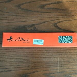 Montana West purse strap. Black and white pattern new inbox. 34 to 56 inches.